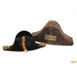 A Naval bicorn hat by Gieves Ltd AF with japanned