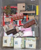 A box containing N Gauge buildings, some Hornby, m