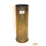 A British 105mm brass shell case dated 1978