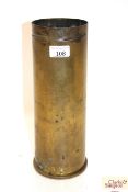 A British 105mm brass shell case dated 1978