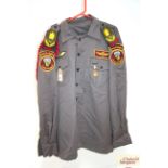 A Gulf war era Iraqi shirt with insignia and trous