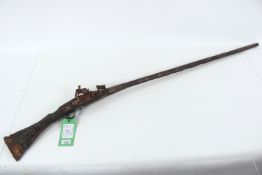 An antique Middle Eastern flintlock Jezail, this e