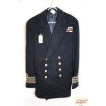 A post war Royal Navy jacket named to N.F.S. Wykes