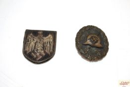 Two Third Reich era badges including a wound badge