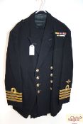 A Royal Navy dress jacket, Portsmouth label to D.T