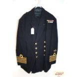 A Royal Navy dress jacket, Portsmouth label to D.T