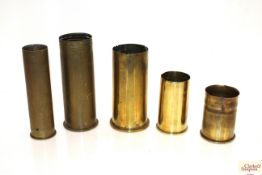 Five various brass shell cases including three WWI