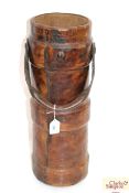 A vintage Royal Navy leather cordite keg