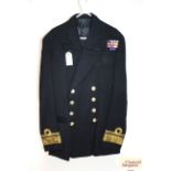 A Royal Navy dress jacket, label J.W.D. Cook with