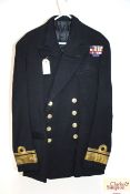 A Royal Navy dress jacket, label J.W.D. Cook with