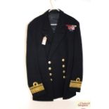 A Royal Navy jacket, label to J.W.D. Cook with Re