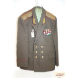 A U.S.S.R. Generals jacket with insignia, badge an