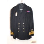 A Royal Navy jacket with Rear Admiral insignia and