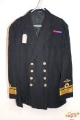 A Royal Navy jacket with Rear Admiral insignia and