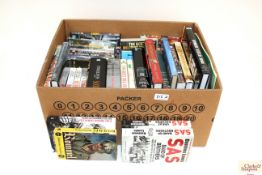 A box of military related books and DVD's
