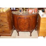 A mahogany demi-lune side cabinet