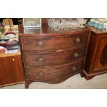 A mahogany bow fronted chest of three drawers