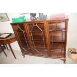 An early 20th Century mahogany display cabinet rai