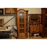 A modern pine display cabinet