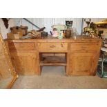 An antique pine dresser base