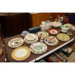 A collection of various decorative porcelain plate