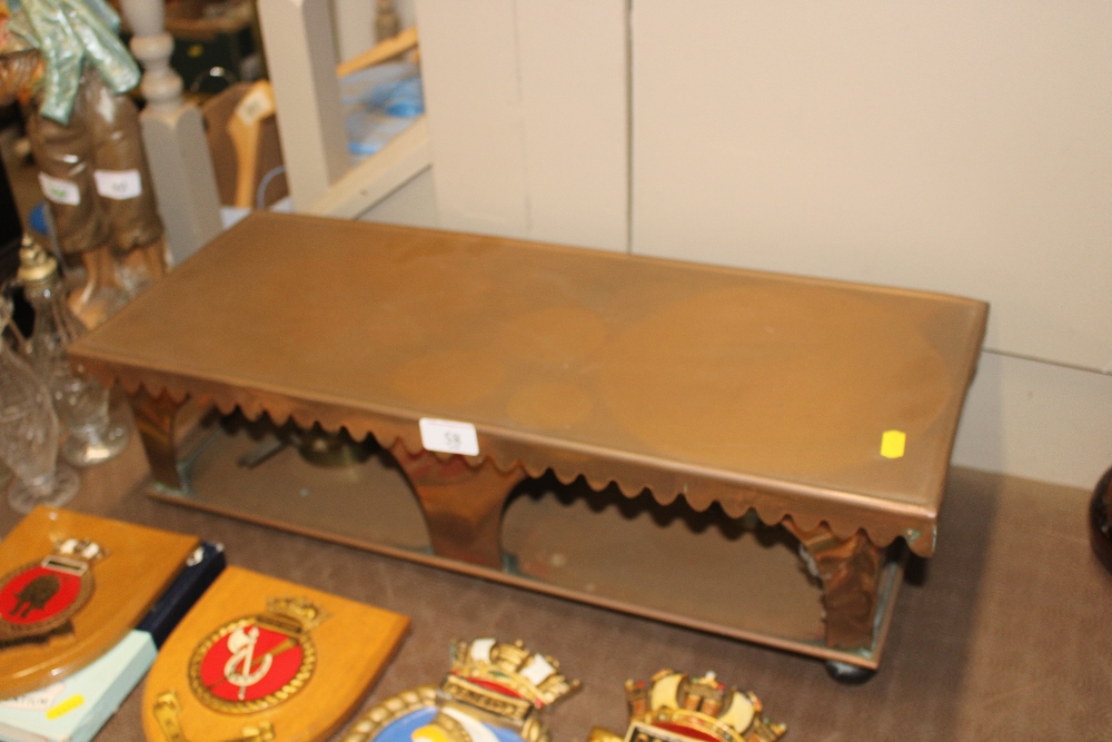 An early 20th Century copper two burner hot plate