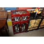 A Chinese hardstone inlaid cabinet