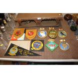 A collection of various military and naval plaques