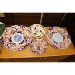 Two large Japanese Imari chargers; a small Japanes