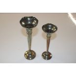Two silver spill vases with loaded bases