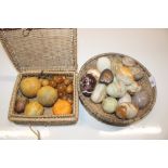 Two baskets containing artificial fruit and onyx e