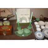 An Art Deco green glass dressing table set