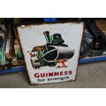 A reproduction Guinness advertising sign