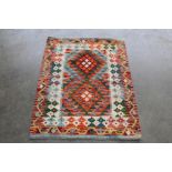 An approx. 3'7" x 2'7" Chobi Kelim rug