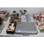 A collection of kitchen utensils, cased knife set,