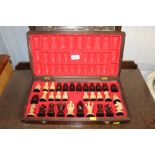 A cased wooden chess set