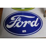 A reproduction enamel Ford advertising sign