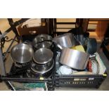 Two boxes containing kitchenalia including pots an