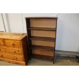 An oak open fronted bookcase