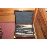 A case containing drawing instruments