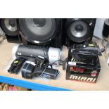 A Mirai Powerzoom camera, a laminator, torch and a