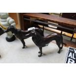 Two reproduction bronzed model dogs