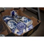 A box of mostly blue and white china to include "O