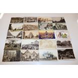 A box of London and other postcards