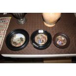 Three framed Pratt ware lids