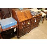 A mahogany bureau fitted four drawers
