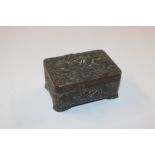 An Oriental cast metal trinket box and cover with d