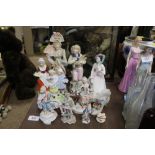 A collection of various porcelain figurines