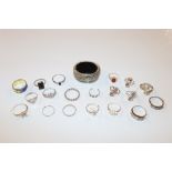 A quantity of silver and white metal rings etc