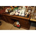 A leather topped twin pedestal writing desk fitted